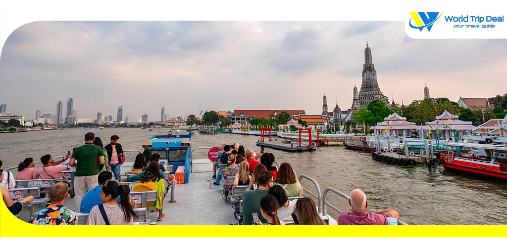 Take a boat tour to see the atmosphere along the chao phraya river at wat arun in bangkok thailand – world trip deal
