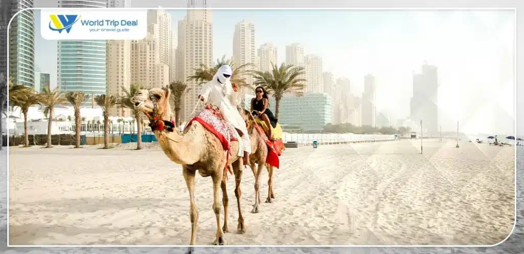 Tourist riding camel in dubai – world trip deal